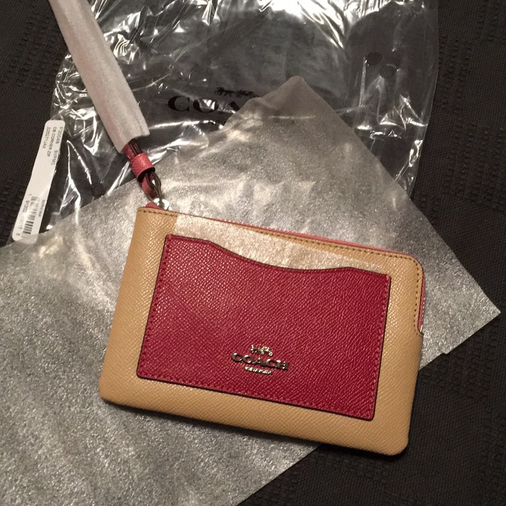 Women's Coach signature corner zip wristlet